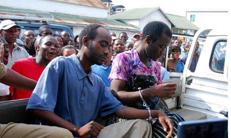 Stephen Monjeza, left, and Tiwonge Chimbalanga after their arrest