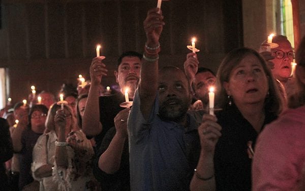 Grief, anger, vows to overcome at Fort Worth vigil for Orlando