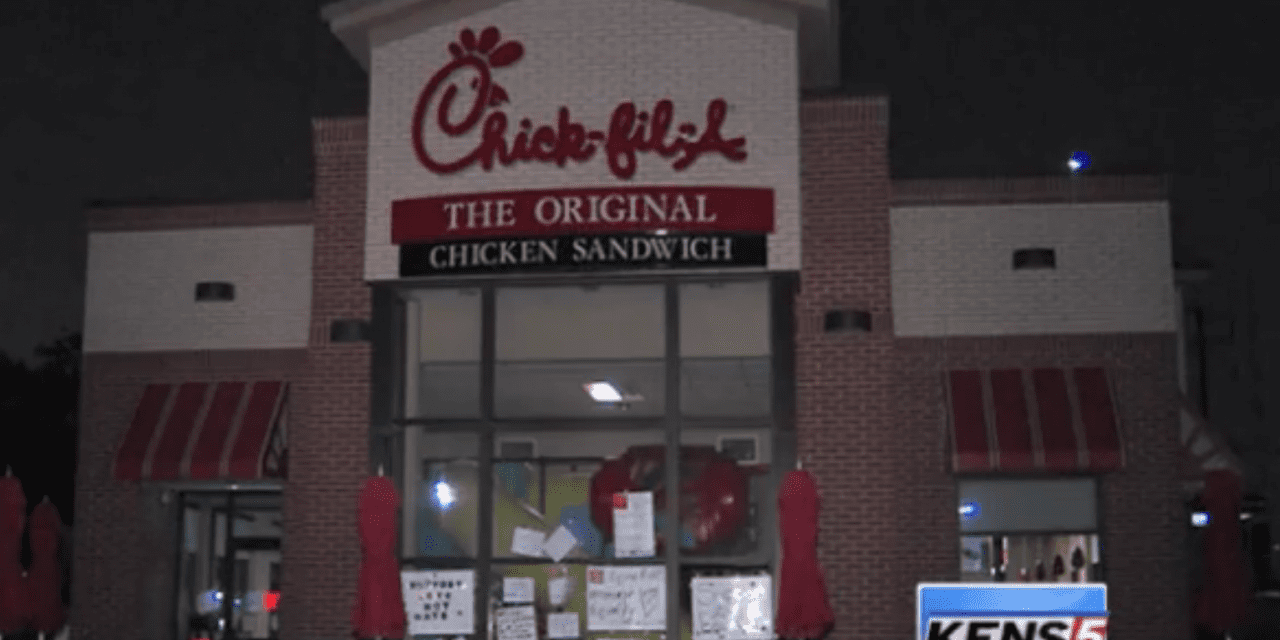 Activists plaster windows of Chick-fil-A with pro-equality signs in San Antonio