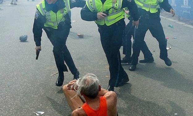 Gay police officer appears in iconic photo from Boston Marathon bombing