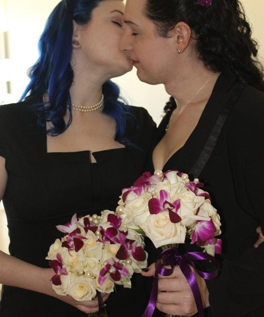 Two lesbian couples — each with a trans partner — marry in Dallas courtroom