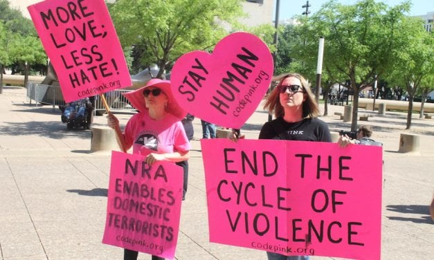 Protesters and counter-protesters mark the NRA’s convention in Dallas