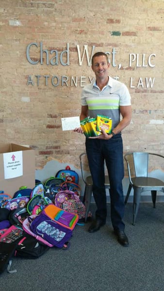 Chad West Law Firm holds Crayons for Kids school supply drive