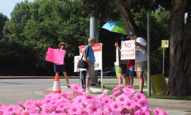 LGBTQ protesters greet Pride in Bloom attendees