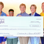 Coalition for Aging LGBTQ makes donation to Resource Center senior housing project