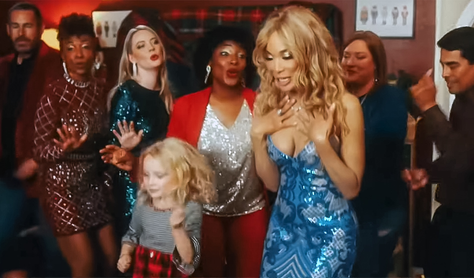 Shilah Phillips, in blue, in her new video for "Please Hurry Christmas," directed by Israel Luna and produced by Joseph Herrera